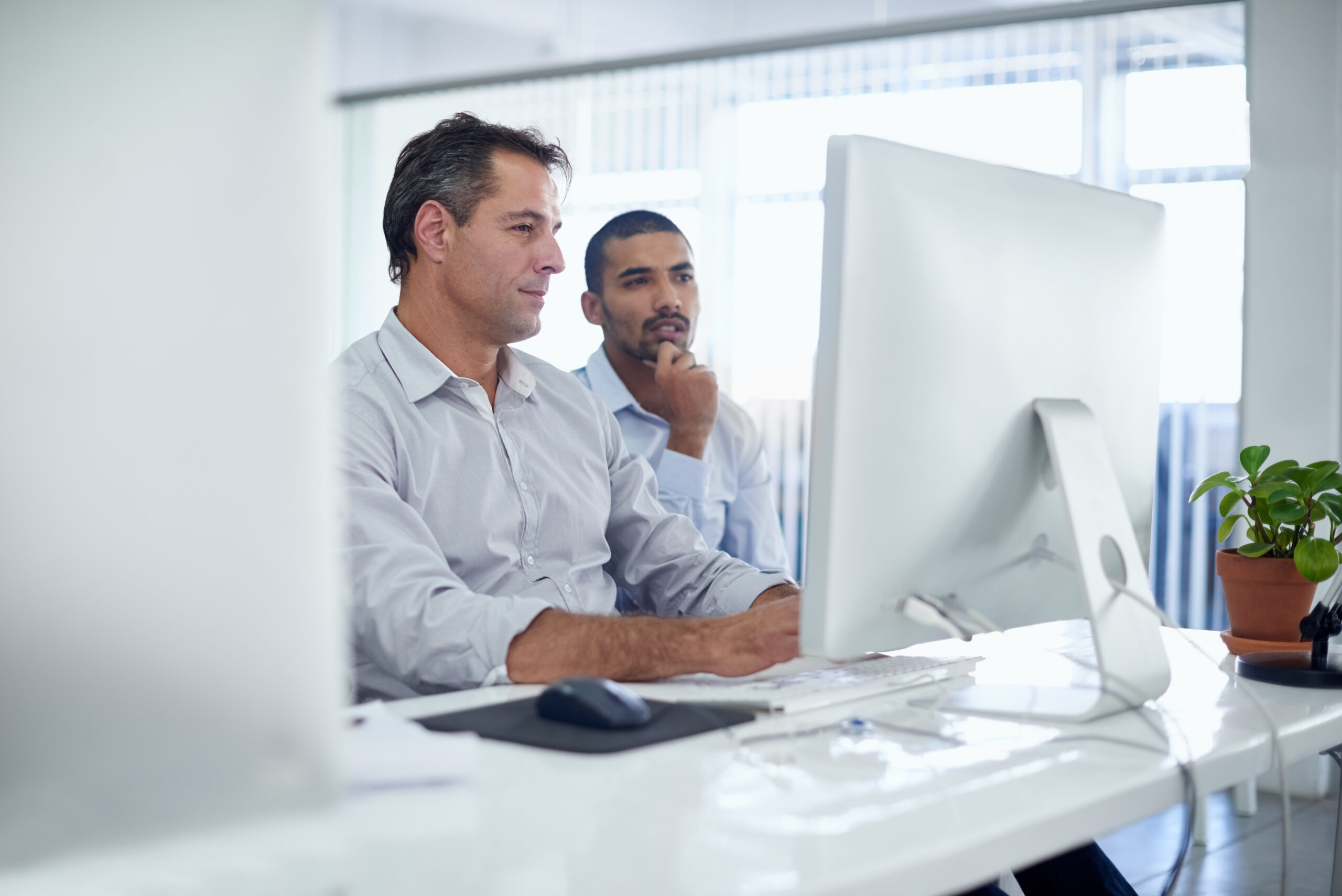 two people at computer
